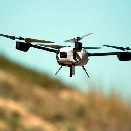 Drone Quadcopter Flying over Field