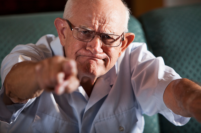 Old man pointing