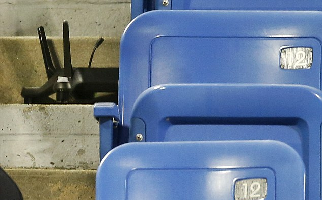 Blue seats in a stadium Louis Armstrong Stadium