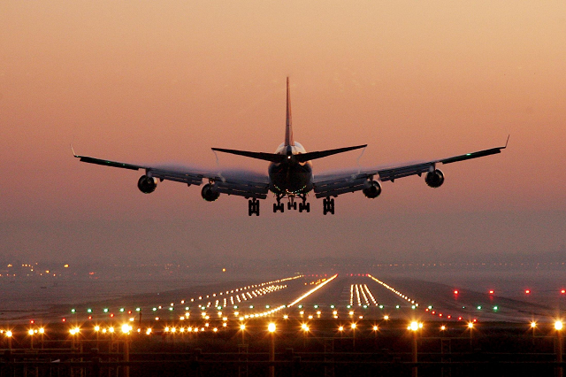 Plane Landing on Runway