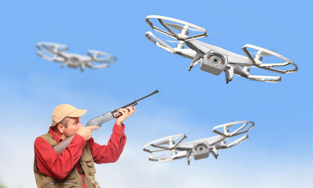 A Man Has Shot Down A Flying Drone Drone Shot Down