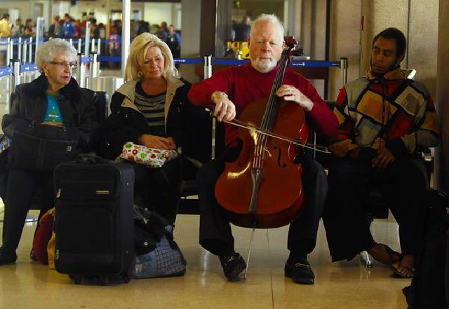 Musicians preparing to travel Traveling Musicians
