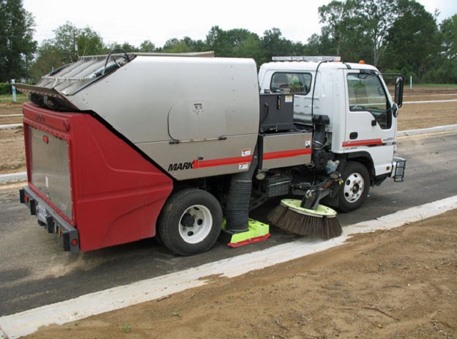 A parked garbage truck Garbage Vehicle