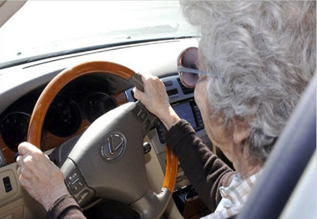 Old woman driving a car Older Drivers