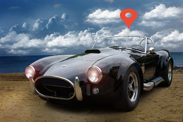 A sports car parked at the beach Sports Car